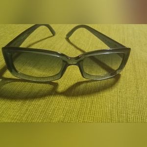 Sunglasses by Givenchy. Like new in case.